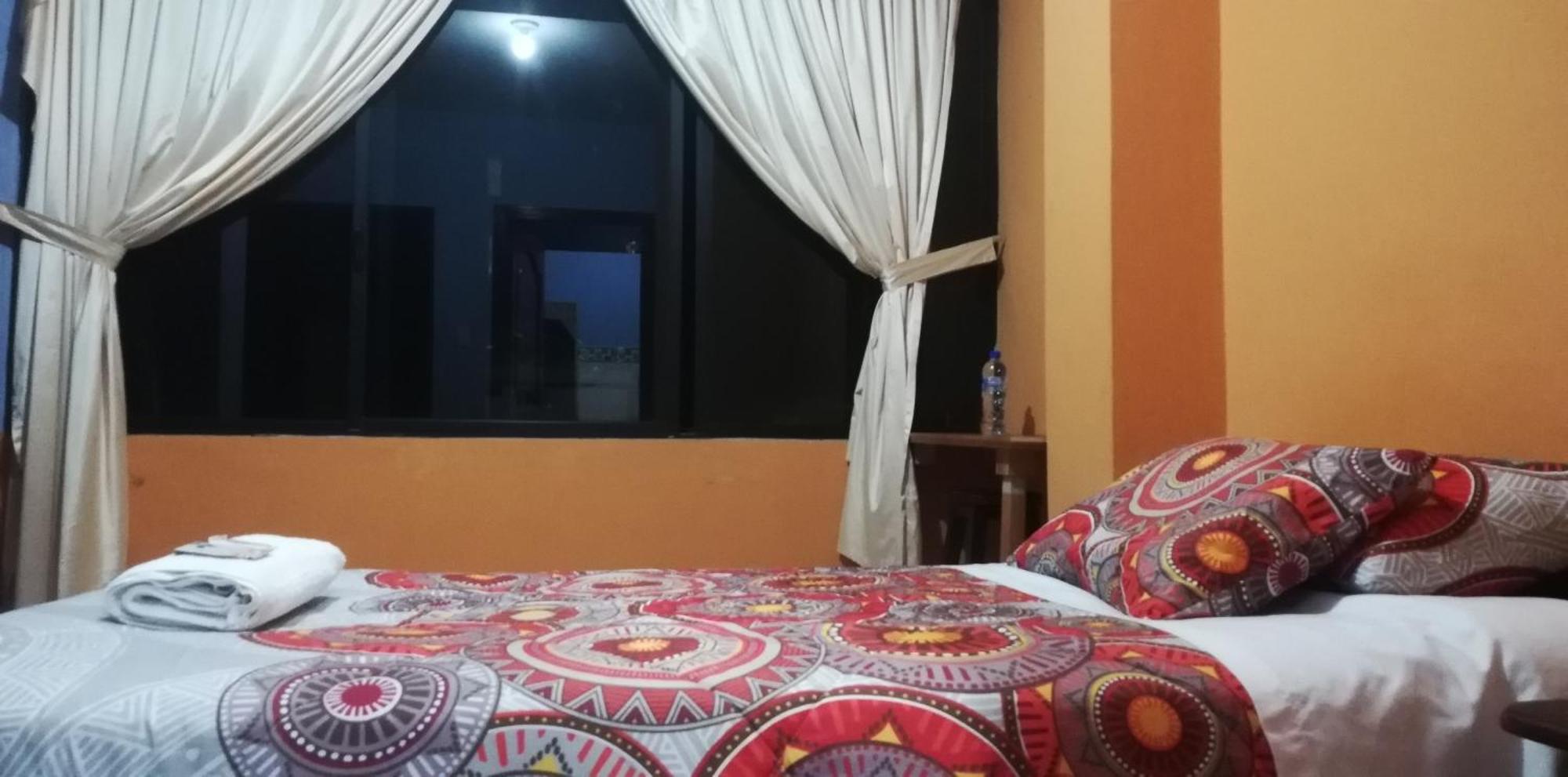 Quédate Aquí Macas Exterior foto